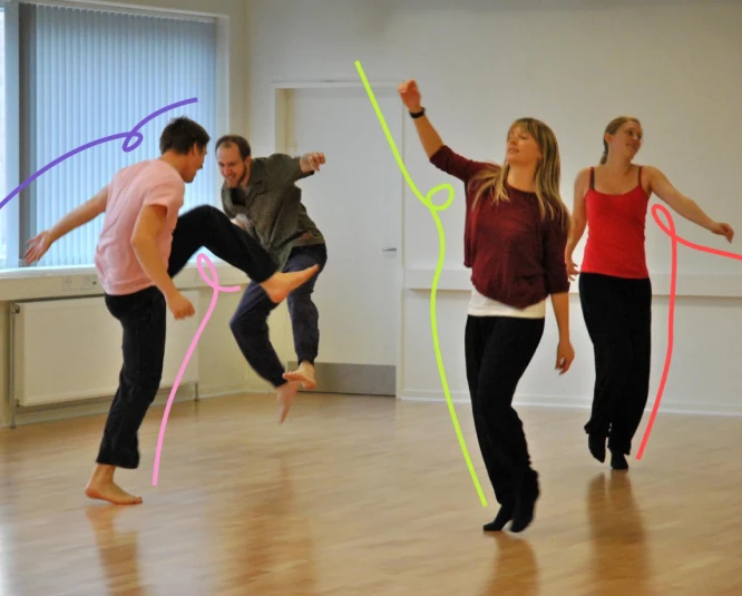 Four young people dancing and jumping
