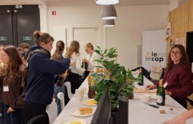 Group of people in front of a snack buffet